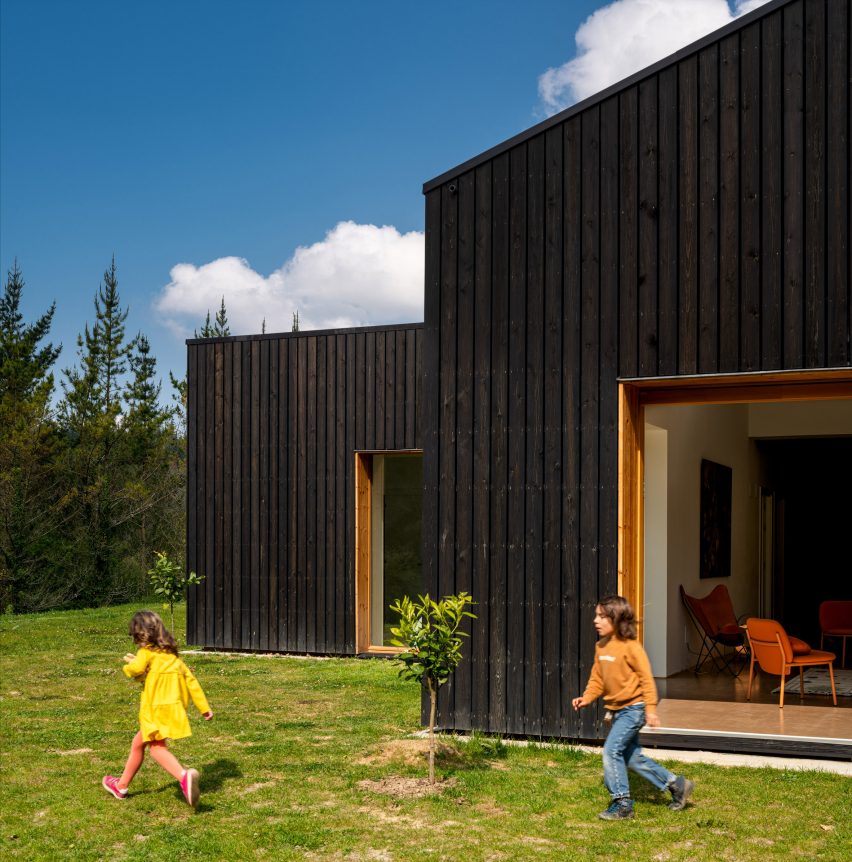 Children playing outside Caserío Azkarraga