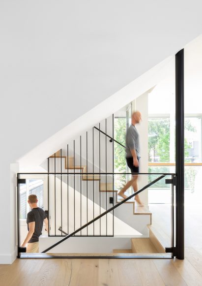 Boathouse Bungalow has a steel and glass staircase