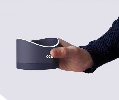 Hand holding the Coso male contraceptive device