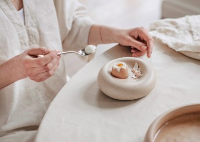 Dish holding a boiled egg
