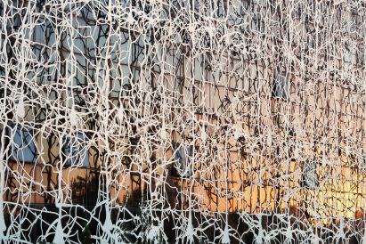 A facade covered in aluminium screens