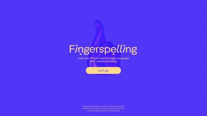 Fingerspelling.xyz home screen showing a 3D model of a hand with its fingers crossed