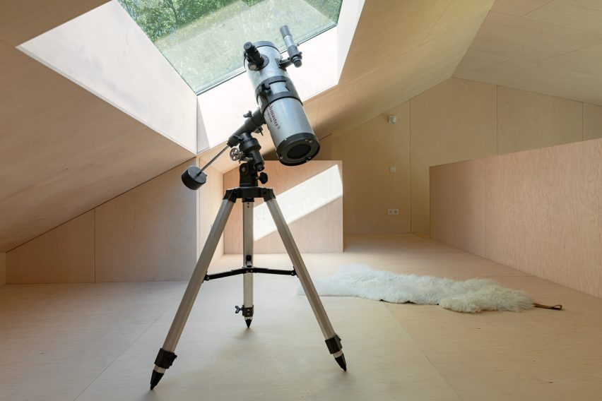 A telescope in the interior of Holiday Home