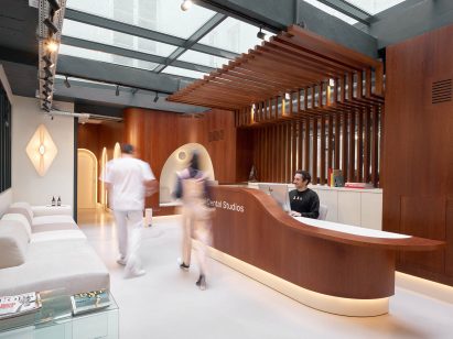 A patient walks through the lobby of a dental practice