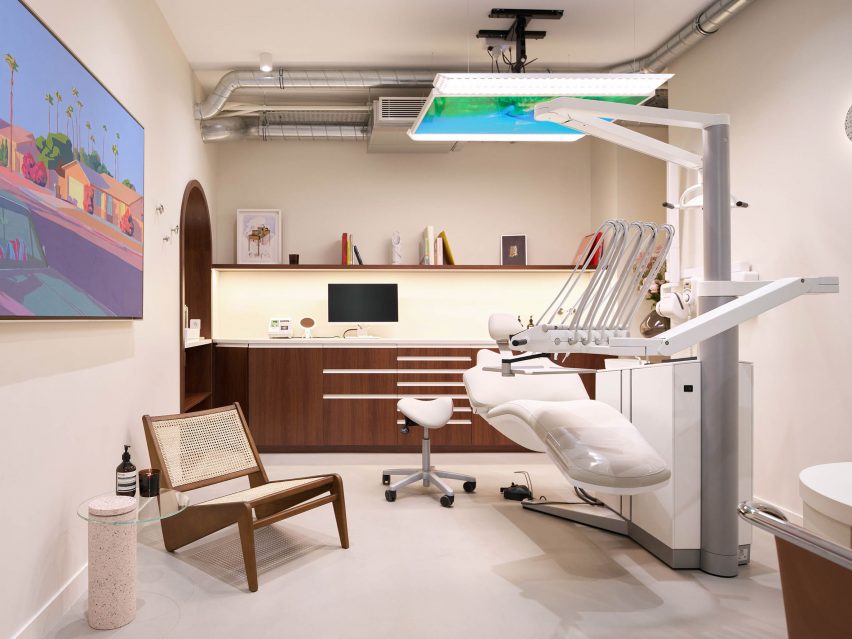 A dentist's room with white floor and brown counters
