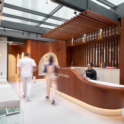 A customer entering a dentist studio reception