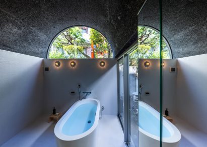 Bathroom with vaulted roof