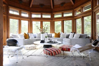 Muskoka cottage by Ali Budd Interiors has wooden window frames