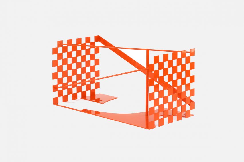 An orange trunk designed by Samuel Ross