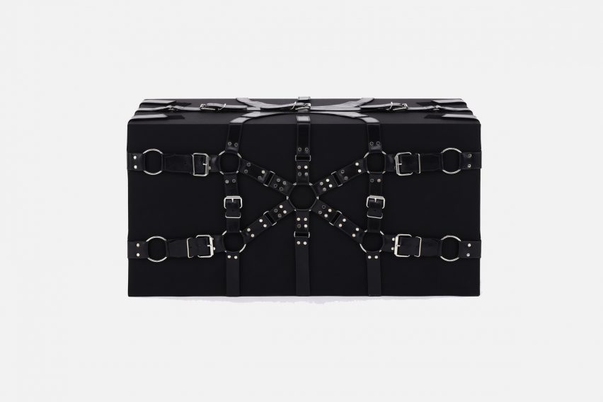 Peter Marino's black trunk with leather straps