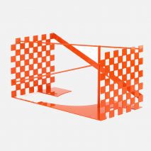 An orange metal Louis Vuitton trunk design