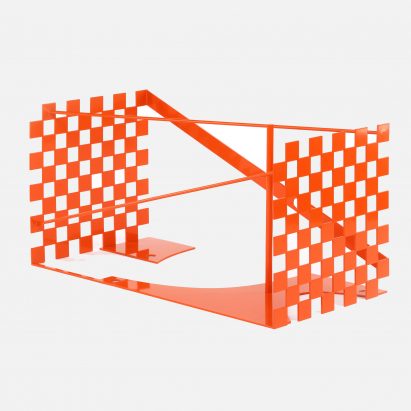 An orange metal Louis Vuitton trunk design