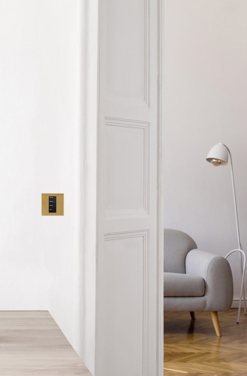 gold light control in a neutral, white interior