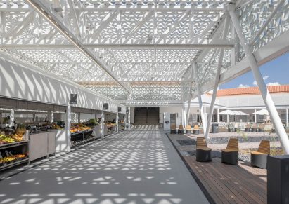 The interior meets a decked courtyard