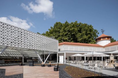 municipal market famalicao is adjoined to an old building