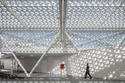 Triangular shadows are cast across the interior of the municipal market famalicao