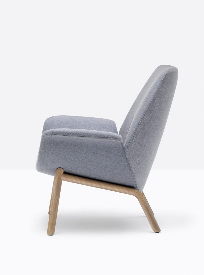 A photo of a grey armchair