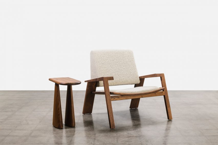 The Rhoco chair, which features a wedge-shaped backrest upholstered in wool and mohair boucle