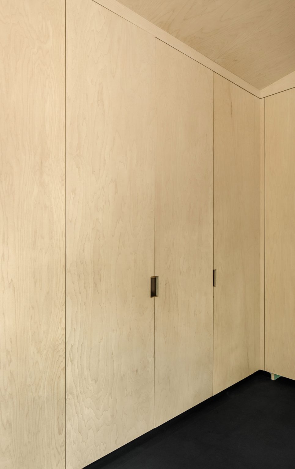 A white wardrobe inside Shed-O-Vation