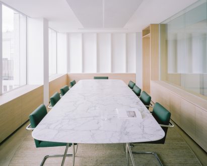 A large office table and chairs