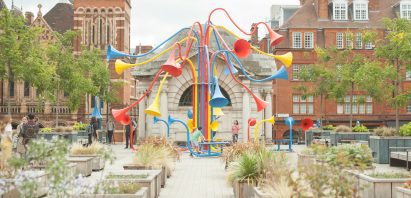 The sculpture is brightly coloured