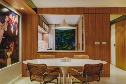 Studio Hagen Hall added wooden cabinetry to the kitchen