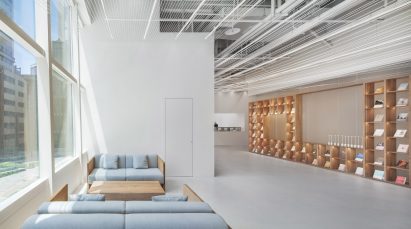 Three sofas inside the white lobby of The Glade Bookstore