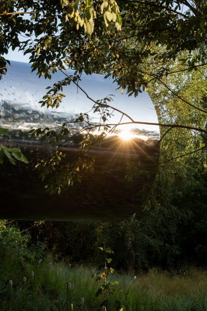 Sun reflecting off stainless steel cladding of Russian Quintessential house