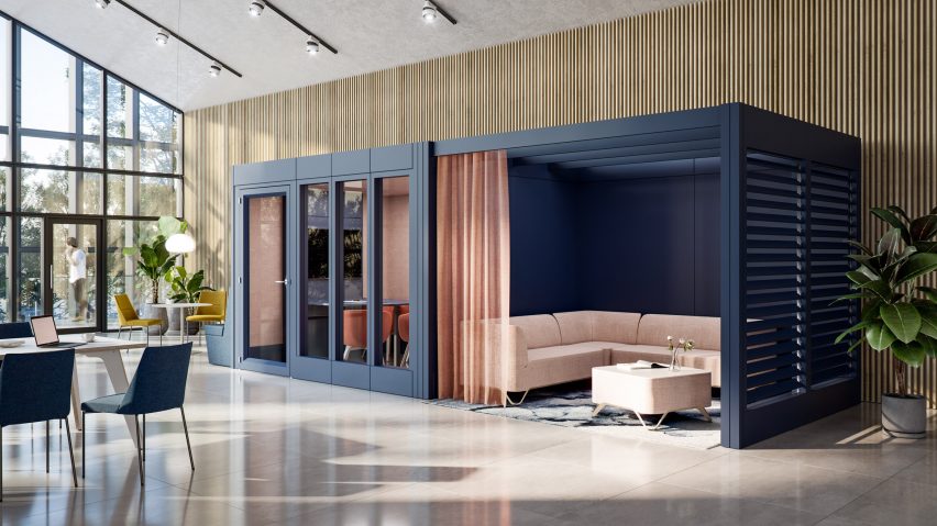 Black meeting room module inserted into an open workspace with a blush pink dividing curtain opening onto a relaxed meeting space with sofas