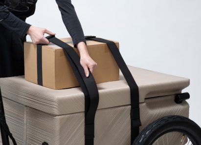 Cardboard box strapped onto transport box of ZUV