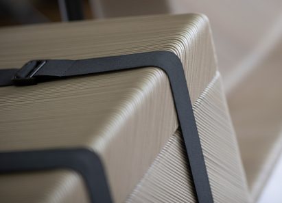 Close-up of storage box with straps on electric tricycle EOOS NEXT