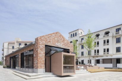 BLUE inserted a rectangular volume to an existing red brick