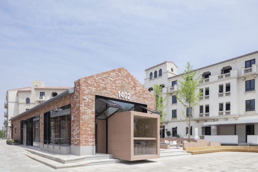 BLUE inserted a rectangular volume to an existing red brick