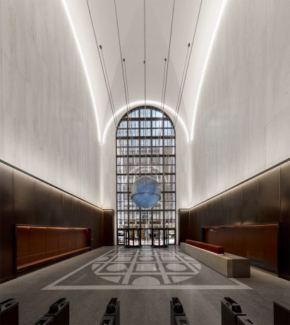 The lobby of 550 Madison features terrazzo marble and bronze