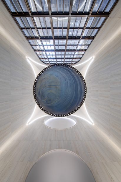 The installation at 550 Madison is a large blue sphere