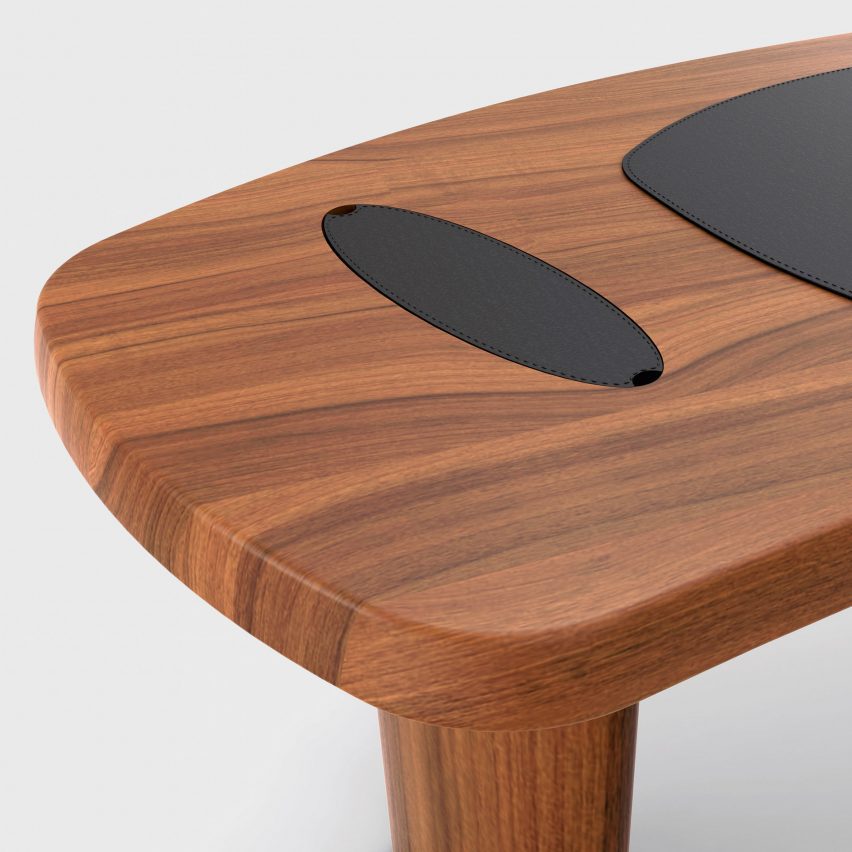 The desk made from leather and wood