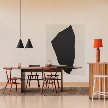 Dining room with wodden table and colourful chairs