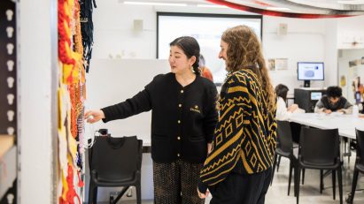 Parson's Design students looking at a textile exhibition