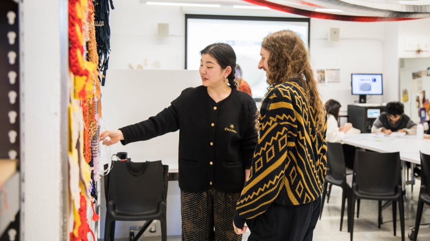 Parson's Design students looking at a textile exhibition