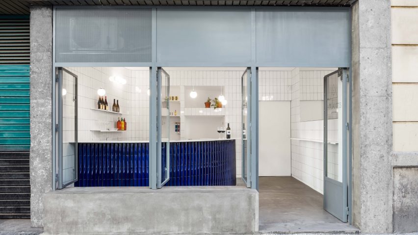 A photograph of a gastro bar that uses blue and white tiles