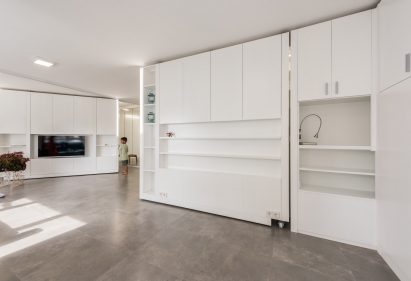 White wooden units rotate and spin