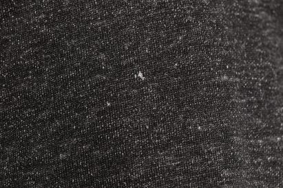 Close-up of fabric dyed with black ink by Living Ink