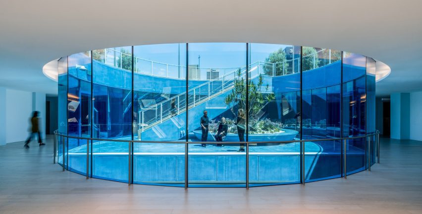 Blue glass surrounding the sunken roof garden