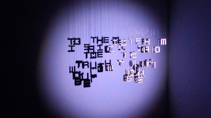 Multiple strings of letters arranged into words with different words displaying in the shadows