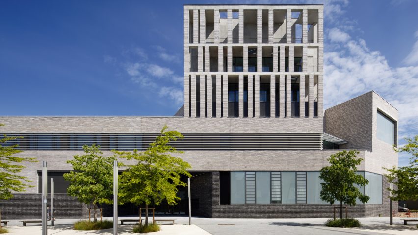 The building has a gridded exterior