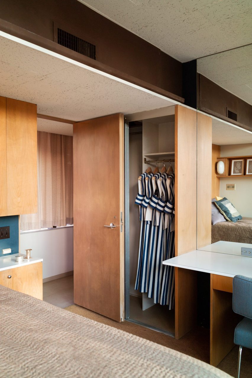 Garments hung in a bedroom wardrobe