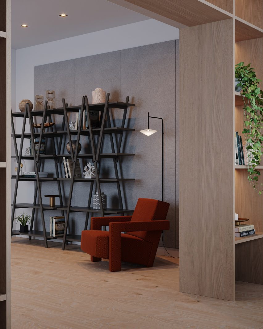 A photograph of a grey bookcase and red chair