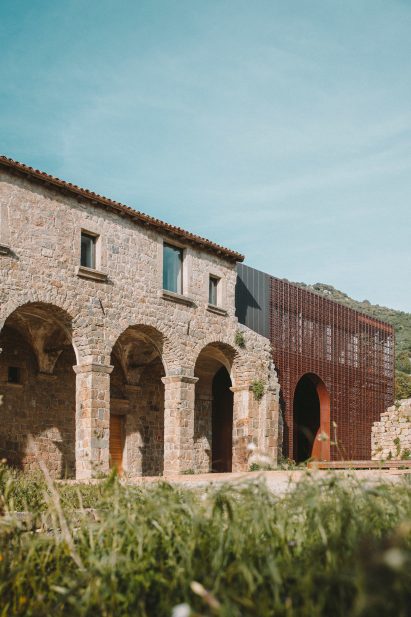 Large arches punctuate the walls of the structure 