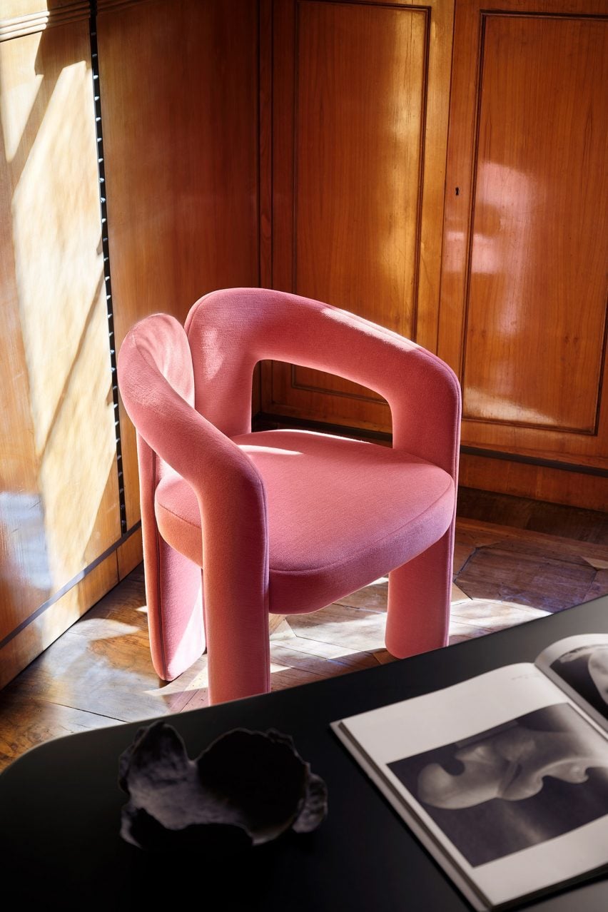 A pink Dudet dining chair
