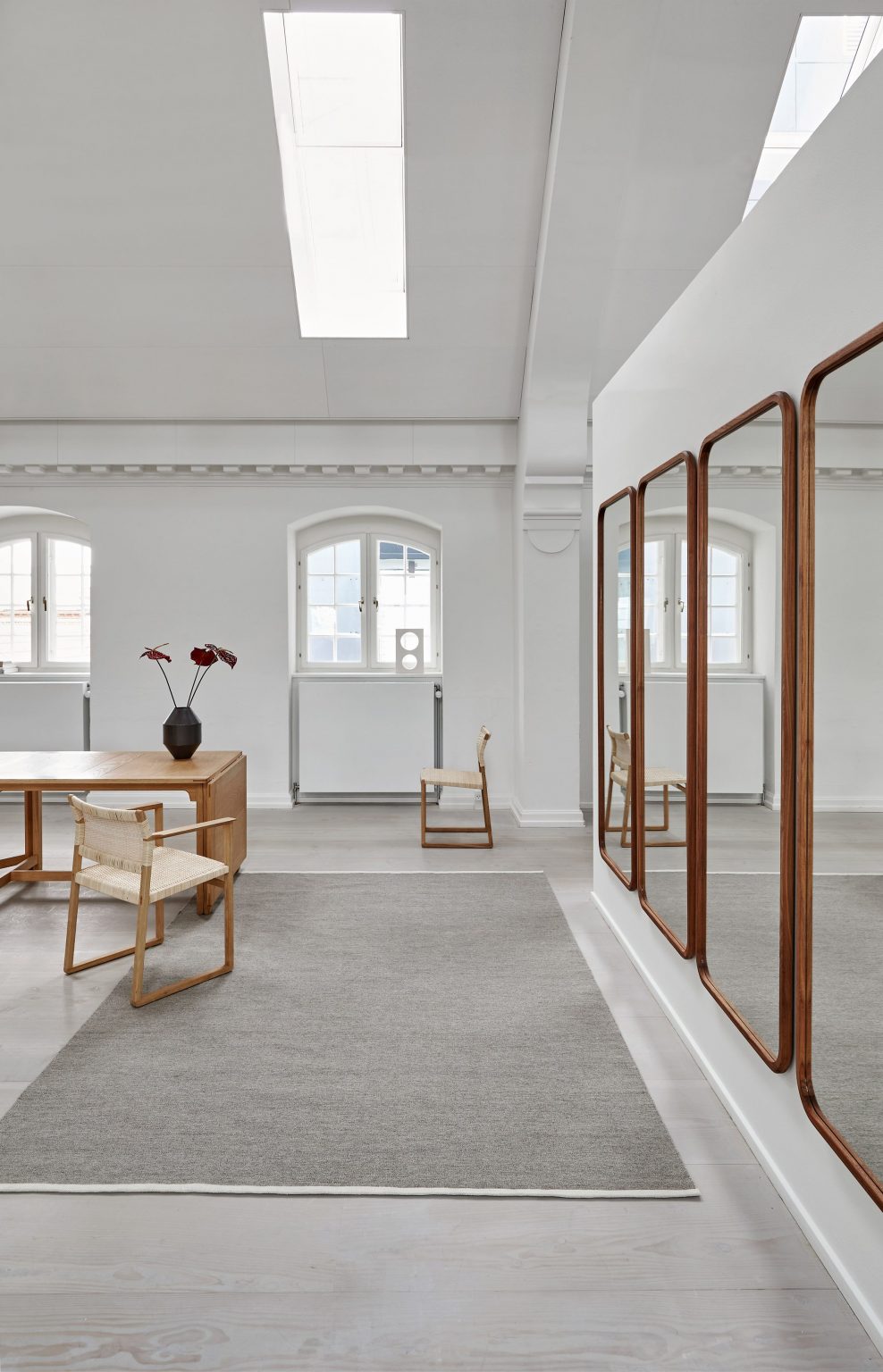 A photograph of Escape Kelim rug by Space Copenhagen for Massimo Copenhagen